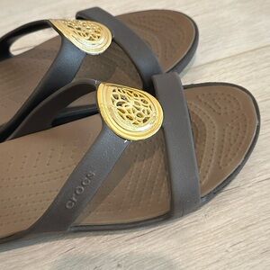 CROCS Women's Sandals with Black Straps and Gold Accents